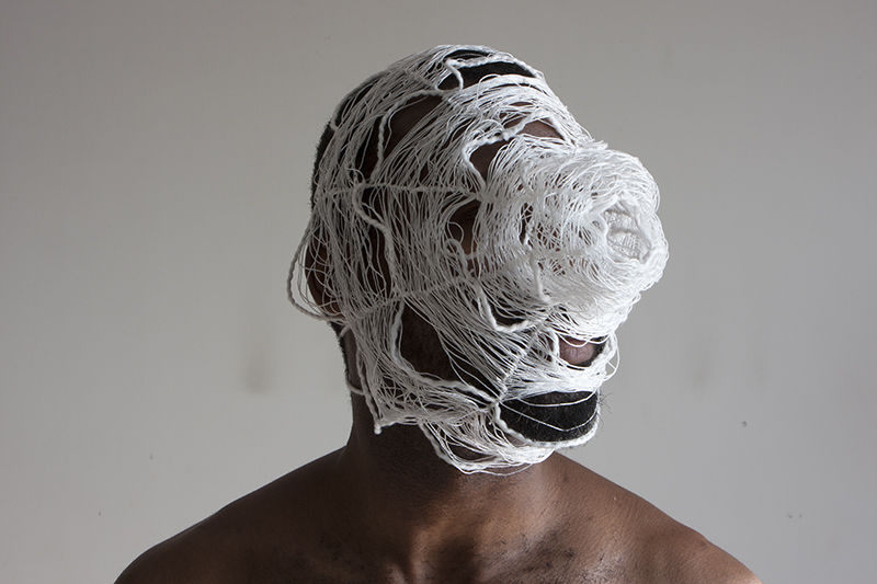 Trokon_Nagbe-03_Reactions_2015__white_thread_garment_wrapped_around_face_dimension_of_garment
