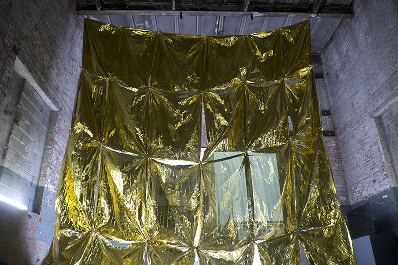 Wall (Or Interior Window at Night), 2016 Installation (thermal blankets) 21’ (w) x 28’ (h)