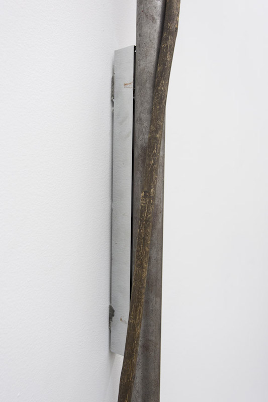 Detail of Untitled (for S.G. Schell, a channel through which something (as a fluid) is conveyed), 2016 Walking stick, steel pipe, chrome plated neodymium magnet and hardware. 4’ x 1’ x 6”