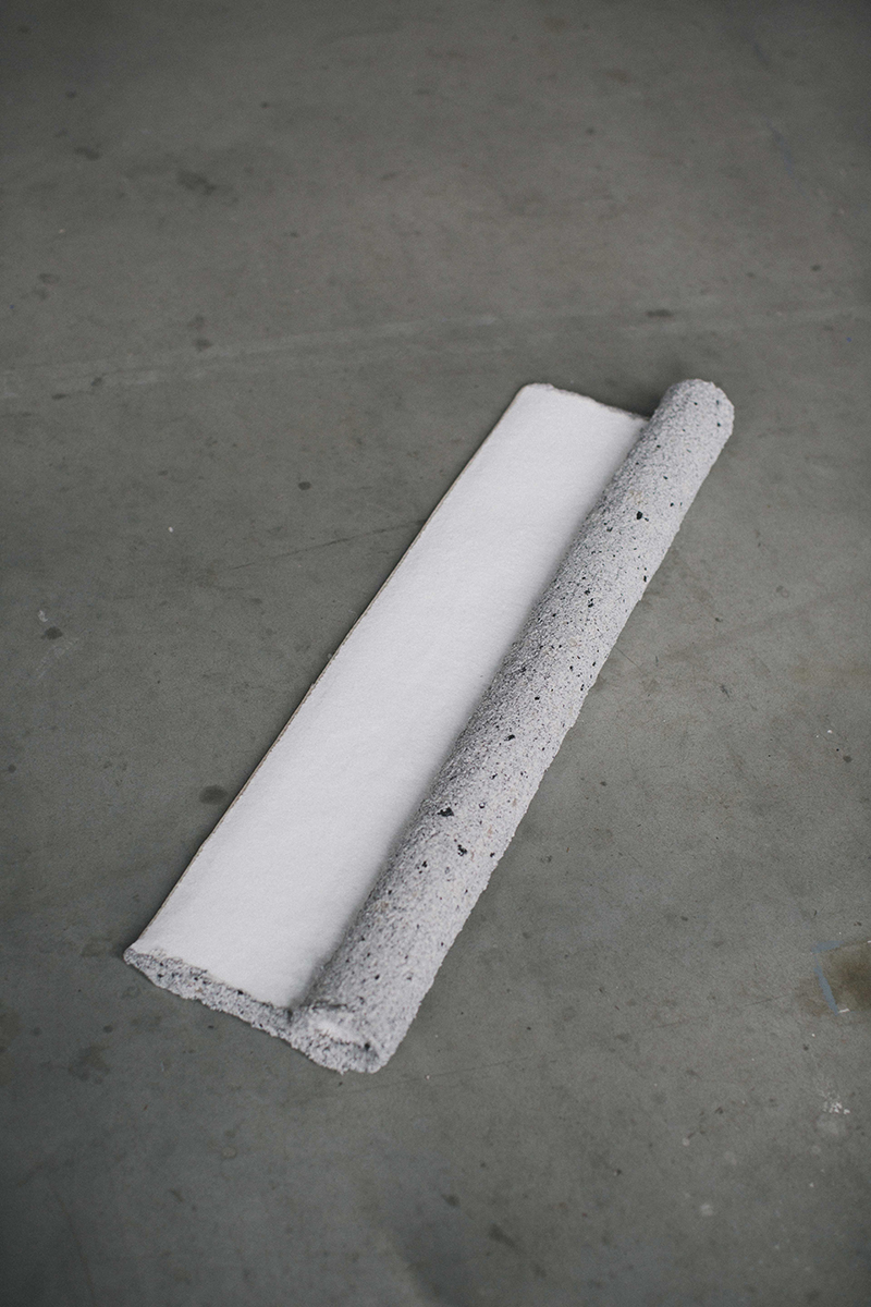Carpetbagger, 2015 Synthetic carpet, resin, stucco, and cement 36” x 4” x 18”
