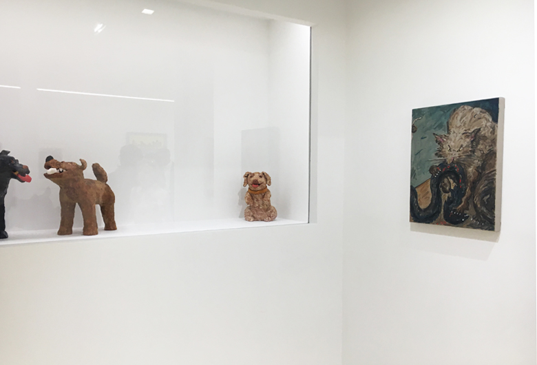 Installation view, pictured on right: Second Death, next to ceramics by Sally Saul.