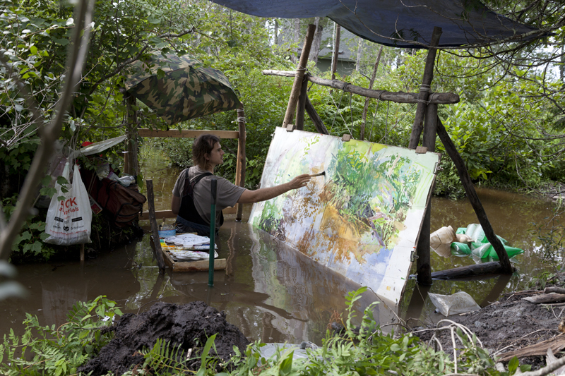 18.Documentation image of submerged plein-air painter demonstrating the use of his floating easel, floating palette, and perspective frame. 2018